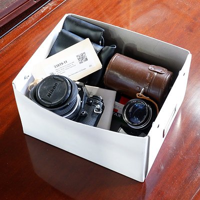 Nikon EM 35mm Camera with Nikkor 28mm 1:2.8 lens, Takumar 1:3.5 135mm Lens and Accessories