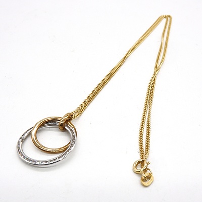 9ct Yellow and White Gold Circle Pendant on 9ct Yellow Gold Curb Link Chain, 4.9g