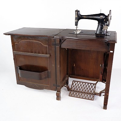 Vintage New Century Ace Treadle Sewing Machine in Walnut Cabinet