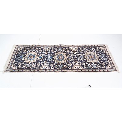 Small Persian Hand Knotted Wool Pile Rug with Floral Motifs on a Dark Blue Ground
