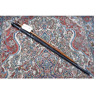 Carved Ebony Walking Stick and Another