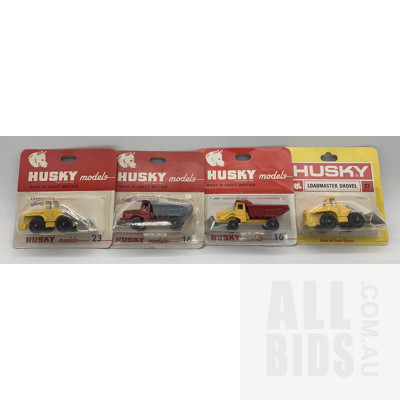 Four Vintage Husky Diecast Model Cars in Original Blister Packs