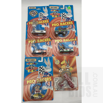 Five Matchbox and One ERTL Diecast Looney Tunes Themed Models