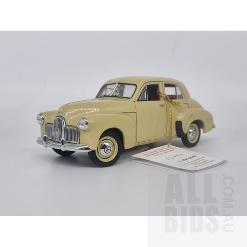 TRAX Holden 48-215 (FX) Bone Ivory with Red Interior with Display 1:24 Scale Model Car