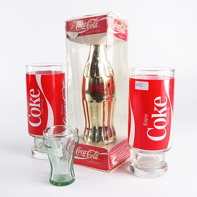 Vintage Gold Coca Cola 8 Oz Bottle and Three Collectable Glasses