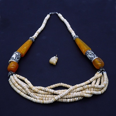 Bone and Bakelite Necklace and a Mother of Pearl Monkey