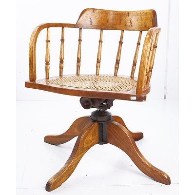 Antique Spindleback Captains Chair with Woven Rattan Seat