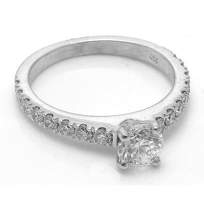 Certified Round Brilliant-Cut Diamond Ring. Total Diamond Weight = 1.04 Cts