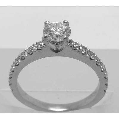 Certified Round Brilliant-Cut Diamond Ring. Total Diamond Weight = 1.04 Cts