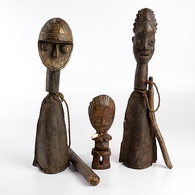 Two Hand Crafted African Hand Bells and a Carved Wooden Tiki