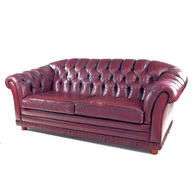 Burgundy Leather Upholstered Deep Button Two and a Half Seater Chesterfield