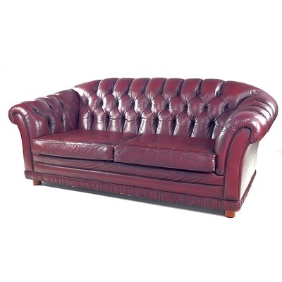 Burgundy Leather Upholstered Deep Button Two and a Half Seater Chesterfield
