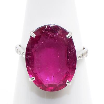 18ct White Gold Ring with a Oval Facetted Pink Tourmaline Surrounded by RBC Diamonds