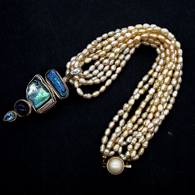 Five Strand Cream Freshwater Pearl Necklace with a Sterling Silver Pendant Set With Amethyst, Topaz, Biwa Pearl and Paua Shell