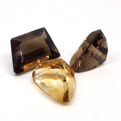 Two Smokey Quartz and One Citrine Freeform Facetted Gemstones
