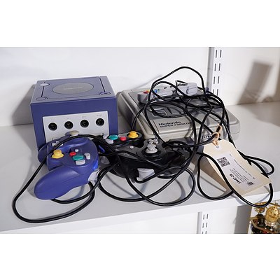 Vintage Nintendo Super Famicom with Controller and Nintendo Gamecube with Two Controllers