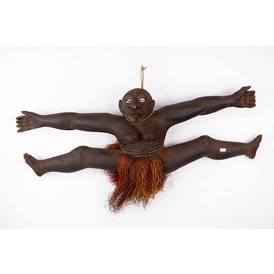 PNG Carved Wooden Figurine with Shell Eyes and Grass Skirt
