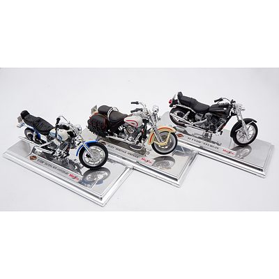 Five Maisto Model Motorbikes on Display Stands