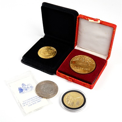 ACT Government Establishment Medallion, Sovereign Hill Souvenir Coin, 1993 British Grand Prix medallion and a Boxed Chinese Medallion (4)