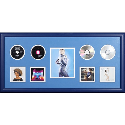 Framed Kylie Minogue Memorabilia Including Four Albums and a Signed Photograph