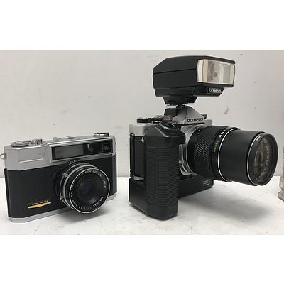 Olympus and Taron 35mm Film Cameras With Accessories