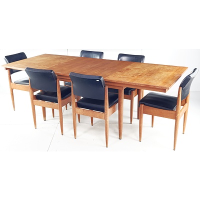 Retro Chiswell Teak Veneer Extension Dining Table with a Set of Six Black Vinyl Upholstered Chairs