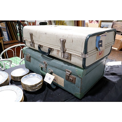 Two Vintage Suitcases with Travel Stickers