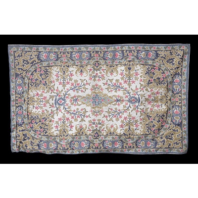 A Two Part Embroidered Wall Hanging Featuring a Floral Motif (2)