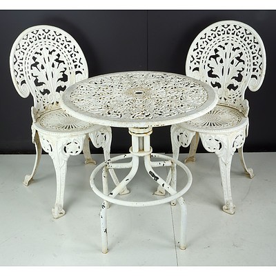 Three Piece Cast Iron Table Setting with Two Chairs