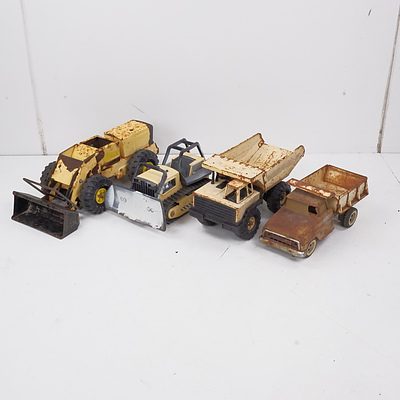 Four Vintage Tonka Toy Trucks