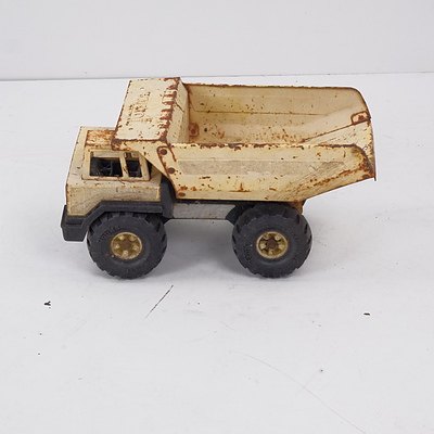Four Vintage Tonka Toy Trucks