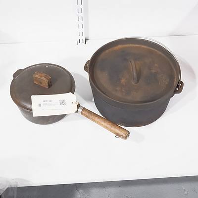 Vintage Cast Iron Dutch Oven with Lid and a Small Cast Iron Lidded Pot (2)
