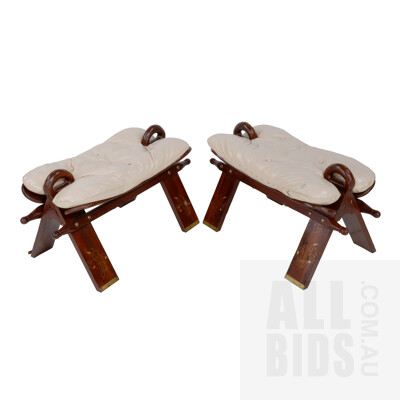 Pair of Brass Inlaid and White Faux Leather Camel Saddle Stools