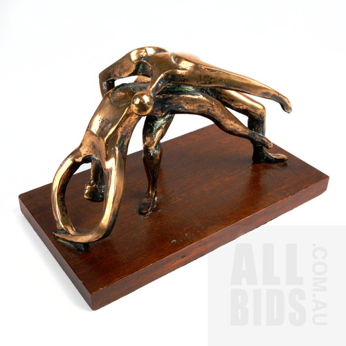 Cast Bronzed Metal Sculpture of Acrobats on a Polished Wood Base