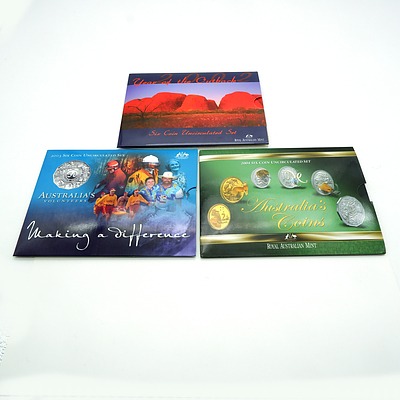Three Uncirculated Coins Sets, 2002, 2004 and 2003