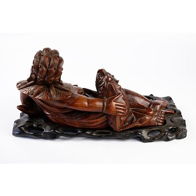 Large Antique Chinese Hardwood Carving of a Reclining Sage, Late 19th to Early 20th Century