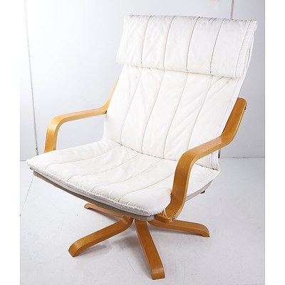 Mid-Century European Beach Swivel Based Lounge Chair with Fabric Upholstery