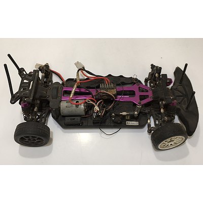 Two RC Cars For Parts Or Repair