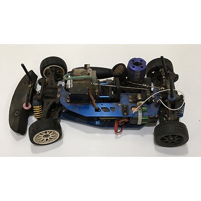 Two RC Cars For Parts Or Repair