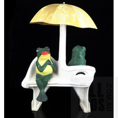 Vintage Cast Composite Frogs Sitting Under an Umbrella