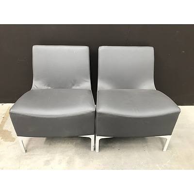 Pair Of PLUS Brown Leather Chairs
