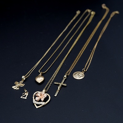 Collection of 9ct Yellow Gold Pendants on Gold Plated Chains