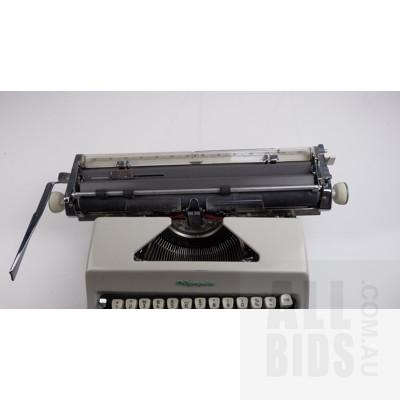 Vintage Olympia Portable Typewriter with Case