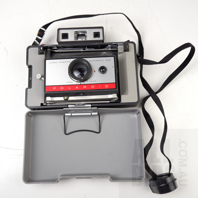 Hitachi Digital Video Camera/Recorder in Case with Accessories and Vintage Polaroid 220 camera in Case with Accessories (2)