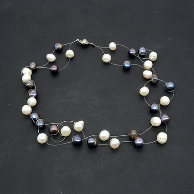 Strand of Freshwater Black and White Pearls