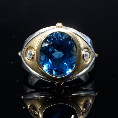 Sterling Silver Ring with London Blue Topaz and CZ