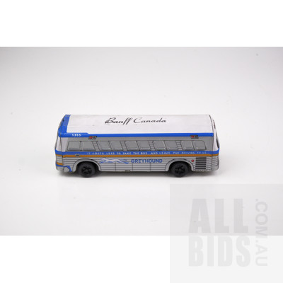 Vintage Greyhound Express Tin Toy Bus with Friction Drive Rear Wheels