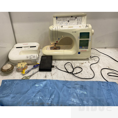 Singer XL-100 Sewing Machine and Accessories