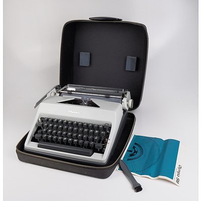 Vintage Olympia SM Portable Typewriter with Case