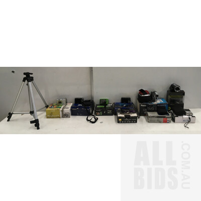Assortment Of Video And Still Cameras